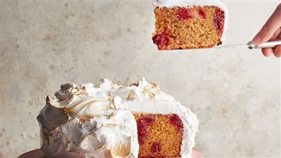 Spiced plum cake with swiss meringue frosting