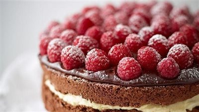Gluten-free chocolate cake with raspberries